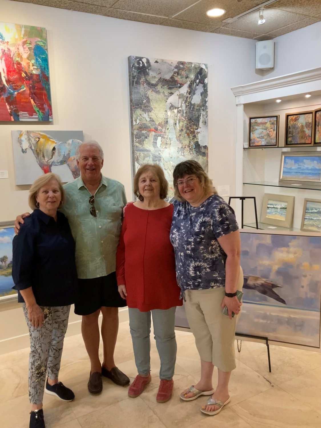 Susan Siegmund (far left) is the owner of Art on Centre in downtown Fernandina Beach.